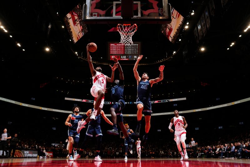 TORONTO, CANADA - JANUARY 22: Immanuel Quickley #5 of the Toronto Raptors drives to the basket during the game against the Memphis Grizzlies on January 22, 2024 at the Scotiabank Arena in Toronto, Ontario, Canada.  NOTE TO USER: User expressly acknowledges and agrees that, by downloading and or using this Photograph, user is consenting to the terms and conditions of the Getty Images License Agreement.  Mandatory Copyright Notice: Copyright 2024 NBAE (Photo by Mark Blinch/NBAE via Getty Images)