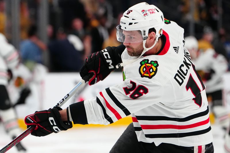 Apr 16, 2024; Las Vegas, Nevada, USA; Chicago Blackhawks center Jason Dickinson (16) warms up before a game against the Vegas Golden Knights at T-Mobile Arena. Mandatory Credit: Stephen R. Sylvanie-USA TODAY Sports