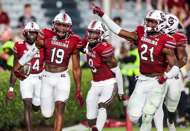 Sep 24, 2022; Columbia, South Carolina, USA; South Carolina Gamecocks linebacker Brad Johnson (19) celebrates an interception against the Charlotte 49ers in the second half at Williams-Brice Stadium. Mandatory Credit: Jeff Blake-USA TODAY Sports