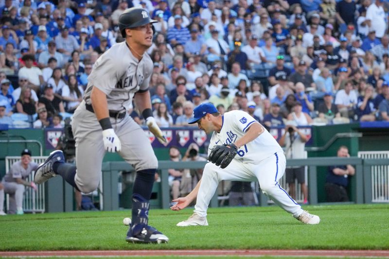 Jun 10, 2024; Kansas City, Missouri, USA; Kansas City Royals starting pitcher Seth Lugo (67) fields an ground ball as New York Yankees shortstop Anthony Volpe (11) runs to first base in the first inning at Kauffman Stadium. Mandatory Credit: Denny Medley-USA TODAY Sports