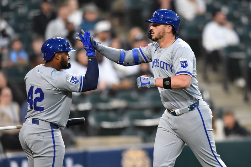 Apr 15, 2024; Chicago, Illinois, USA; Kansas City Royals first baseman Vinnie Pasquantino (right) celebrates his home run with right fielder Nelson Velazquez (left) during the fourth inning against the Chicago White Sox at Guaranteed Rate Field. Mandatory Credit: Patrick Gorski-USA TODAY Sports