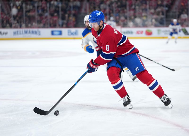 Jan 22, 2026; Montreal, Quebec, CAN;  Montreal Canadiens defenseman Mike Matheson (8) plays the puck during the second period against the Buffalo Sabres at the Bell Centre. Mandatory Credit: Eric Bolte-Imagn Images