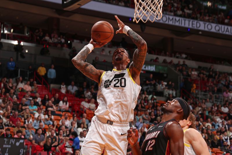 MIAMI, FL - MARCH 2: John Collins #20 of the Utah Jazz drives to the basket during the game against the Miami Heat on March 2, 2024 at Kaseya Center in Miami, Florida. NOTE TO USER: User expressly acknowledges and agrees that, by downloading and or using this Photograph, user is consenting to the terms and conditions of the Getty Images License Agreement. Mandatory Copyright Notice: Copyright 2024 NBAE (Photo by Issac Baldizon/NBAE via Getty Images)