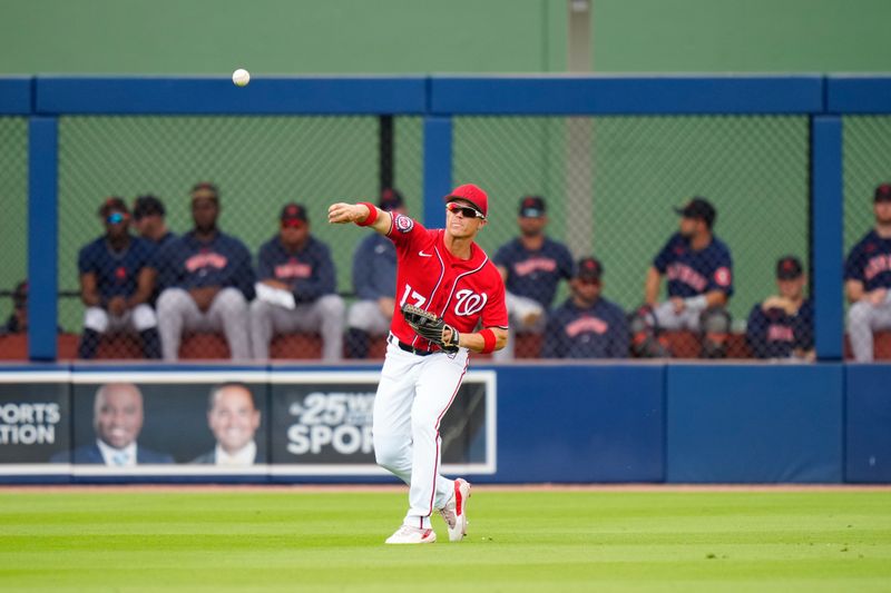 Mar 13, 2023; West Palm Beach, Florida, USA; Washington Nationals left fielder Alex Call (17) throws the ball to third base against the Houston Astros during the third inning at The Ballpark of the Palm Beaches. Mandatory Credit: Rich Storry-USA TODAY Sports