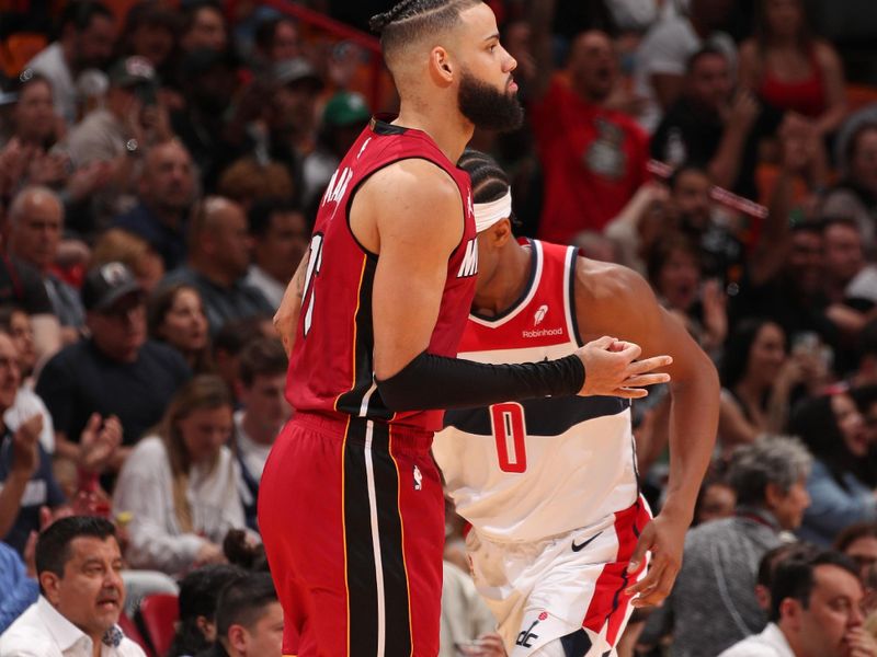 MIAMI, FL - MARCH 10: Caleb Martin #16 of the Miami Heat celebrates three point basket during the game against the Washington Wizards on March 10, 2024 at Kaseya Center in Miami, Florida. NOTE TO USER: User expressly acknowledges and agrees that, by downloading and or using this Photograph, user is consenting to the terms and conditions of the Getty Images License Agreement. Mandatory Copyright Notice: Copyright 2024 NBAE (Photo by Issac Baldizon/NBAE via Getty Images)