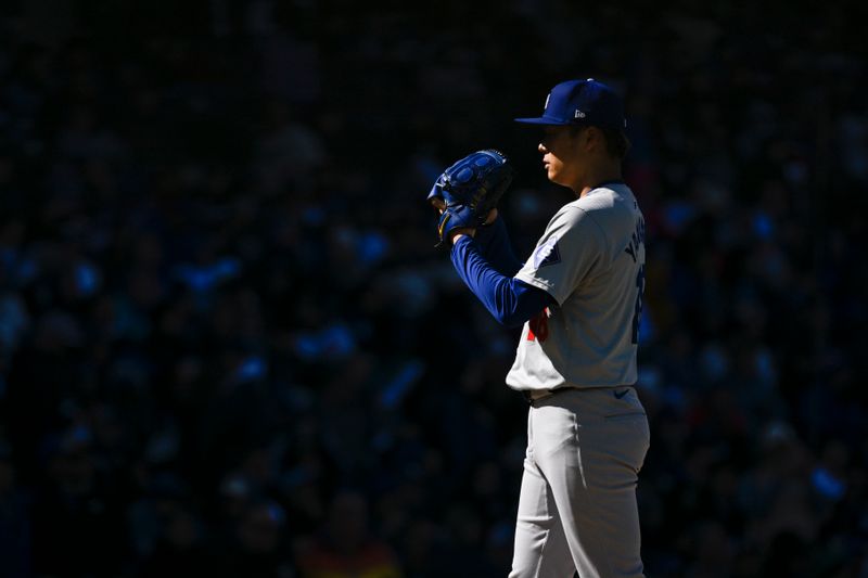 Apr 6, 2024; Chicago, Illinois, USA;  Los Angeles Dodgers pitcher Yoshinobu Yamamoto (18) delivers against the Chicago Cubs during the first inning at Wrigley Field. Mandatory Credit: Matt Marton-USA TODAY Sports