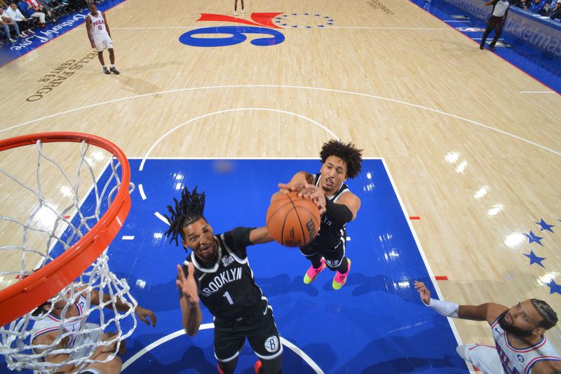 PHILADELPHIA, PA - OCTOBER 16: Ziaire Williams #1 of the Brooklyn Nets rebounds the ball during the game against the Philadelphia 76ers during a NBA preseason game on October 16, 2024 at the Wells Fargo Center in Philadelphia, Pennsylvania NOTE TO USER: User expressly acknowledges and agrees that, by downloading and/or using this Photograph, user is consenting to the terms and conditions of the Getty Images License Agreement. Mandatory Copyright Notice: Copyright 2024 NBAE (Photo by Jesse D. Garrabrant/NBAE via Getty Images)