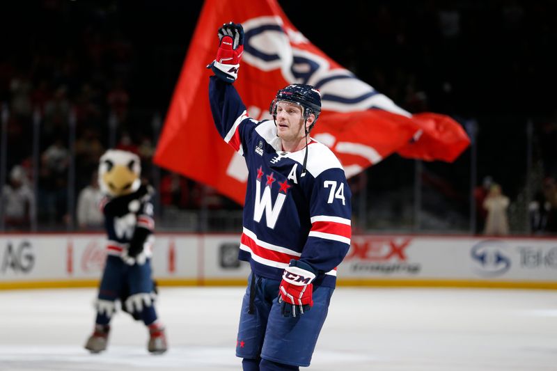 Jan 7, 2024; Washington, District of Columbia, USA; Washington Capitals defenseman John Carlson (74) waves after winning the first star of the game against the Los Angeles Kings at Capital One Arena. Mandatory Credit: Amber Searls-USA TODAY Sports