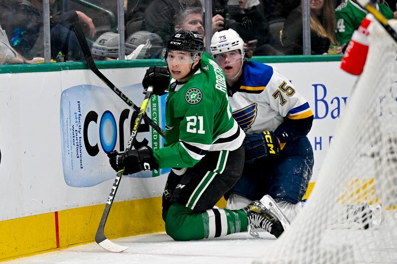 Apr 17, 2024; Dallas, Texas, USA; St. Louis Blues defenseman Tyler Tucker (75) and Dallas Stars left wing Jason Robertson (21) look for the puck in the Blues zone during the second period at the American Airlines Center. Mandatory Credit: Jerome Miron-USA TODAY Sports