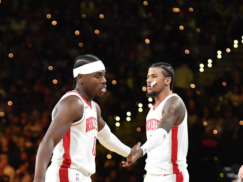 LAS VEGAS, NV - DECEMBER 14: Aaron Holiday #0 and Jalen Green #4 of the Houston Rockets high five during the game against the Oklahoma City Thunder during the Emirates NBA Cup Semifinal game on December 14, 2024 at T-Mobile Arena in Las Vegas, Nevada. NOTE TO USER: User expressly acknowledges and agrees that, by downloading and/or using this Photograph, user is consenting to the terms and conditions of the Getty Images License Agreement. Mandatory Copyright Notice: Copyright 2024 NBAE (Photo by Logan Riely/NBAE via Getty Images)