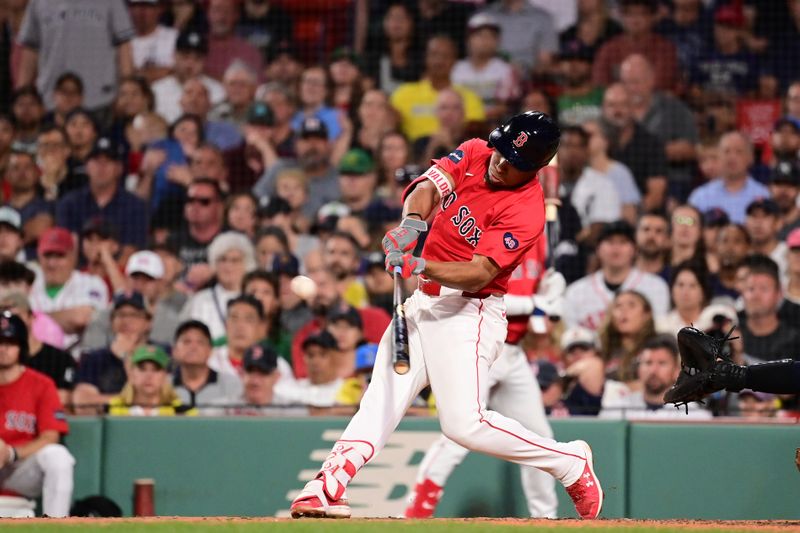 Jun 14, 2024; Boston, Massachusetts, USA; Boston Red Sox second baseman Enmanuel Valdez (47) hits an RBI during the fourth against the New York Yankees inning at Fenway Park. Mandatory Credit: Eric Canha-USA TODAY Sports