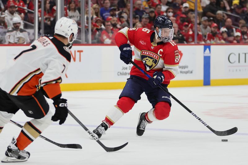 Jan 15, 2024; Sunrise, Florida, USA; Florida Panthers center Aleksander Barkov (16) moves the puck against the Anaheim Ducks during the second period at Amerant Bank Arena. Mandatory Credit: Sam Navarro-USA TODAY Sports