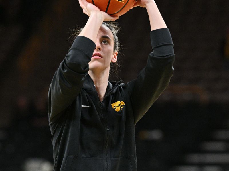 Feb 15, 2024; Iowa City, Iowa, USA; Iowa Hawkeyes guard Caitlin Clark (22) warms up before the game against the Michigan Wolverines at Carver-Hawkeye Arena. Mandatory Credit: Jeffrey Becker-USA TODAY Sports