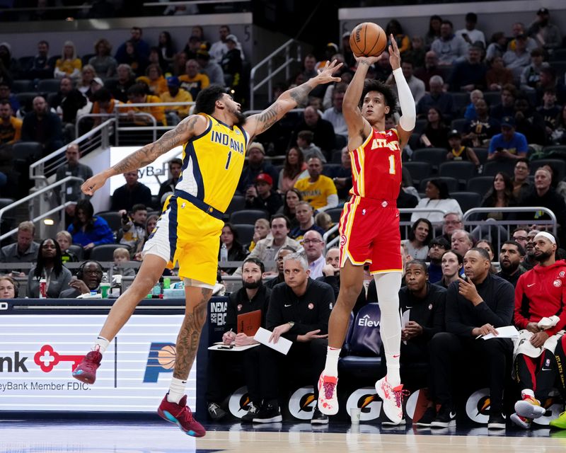 INDIANAPOLIS, INDIANA - JANUARY 05: Jalen Johnson #1 of the Atlanta Hawks attempts a shot while being guarded by Obi Toppin #1 of the Indiana Pacers in the second quarter at Gainbridge Fieldhouse on January 05, 2024 in Indianapolis, Indiana. NOTE TO USER: User expressly acknowledges and agrees that, by downloading and or using this photograph, User is consenting to the terms and conditions of the Getty Images License Agreement. (Photo by Dylan Buell/Getty Images)