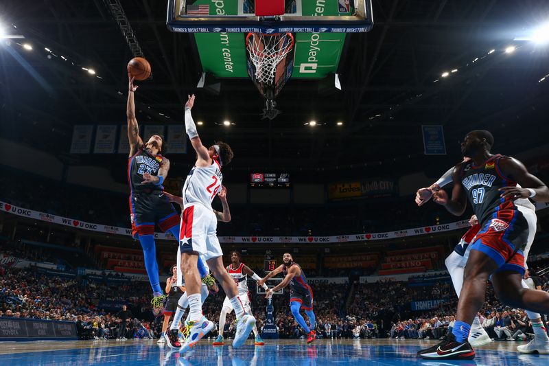 OKLAHOMA CITY, OK - JANUARY 6:  Tre Mann #23 of the Oklahoma City Thunder drives to the basket during the game against the Washington Wizards on January 6, 2023 at Paycom Arena in Oklahoma City, Oklahoma. NOTE TO USER: User expressly acknowledges and agrees that, by downloading and or using this photograph, User is consenting to the terms and conditions of the Getty Images License Agreement. Mandatory Copyright Notice: Copyright 2023 NBAE (Photo by Zach Beeker/NBAE via Getty Images)