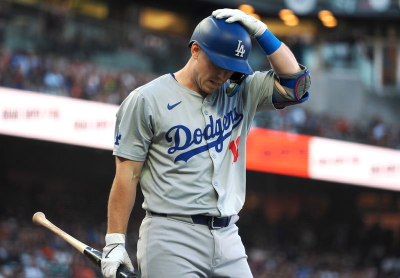 Jun 28, 2024; San Francisco, California, USA; Los Angeles Dodgers catcher Will Smith (16) reacts after striking out against the San Francisco Giants during the first inning at Oracle Park. Mandatory Credit: Kelley L Cox-USA TODAY Sports