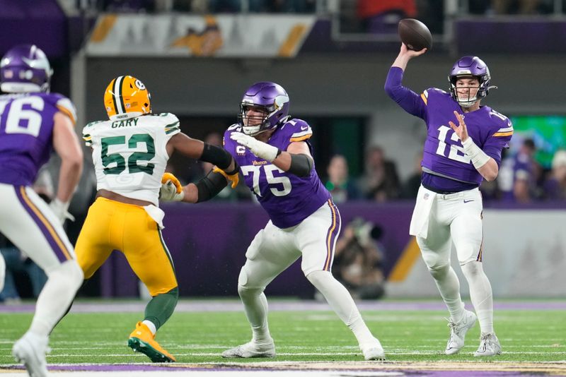 Minnesota Vikings' Nick Mullens throws during the first half of an NFL football game against the Green Bay Packers Sunday, Dec. 31, 2023, in Minneapolis. (AP Photo/Abbie Parr)