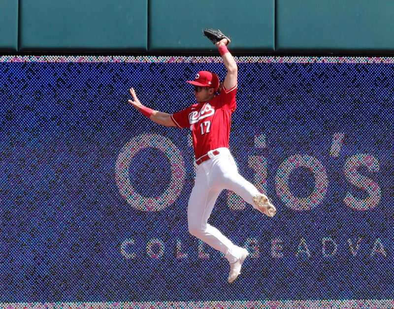 Apr 19, 2023; Cincinnati, Ohio, USA; Cincinnati Reds left fielder Stuart Fairchild (17) catches a fly ball against the Tampa Bay Rays during the eighth inning at Great American Ball Park. Mandatory Credit: David Kohl-USA TODAY Sports