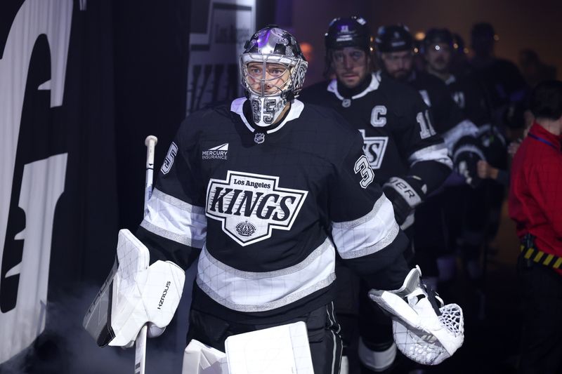 Nov 4, 2025; Los Angeles, California, USA;  Los Angeles Kings goaltender Darcy Kuemper (35) enters the ice for the game against the Winnipeg Jets at Crypto.com Arena. Mandatory Credit: Kiyoshi Mio-Imagn Images