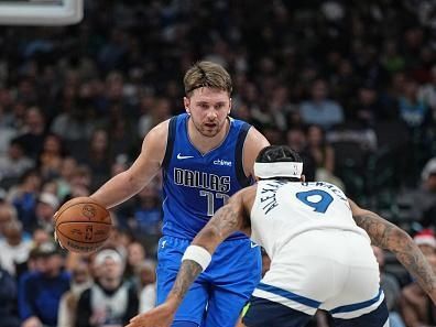 DALLAS, TX - DECEMBER 14: Luka Doncic #77 of the Dallas Mavericks dribbles the ball during the game against the Minnesota Timberwolves on December 14, 2023 at the American Airlines Center in Dallas, Texas. NOTE TO USER: User expressly acknowledges and agrees that, by downloading and or using this photograph, User is consenting to the terms and conditions of the Getty Images License Agreement. Mandatory Copyright Notice: Copyright 2023 NBAE (Photo by Glenn James/NBAE via Getty Images)