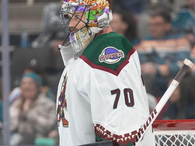 Dec 21, 2023; San Jose, California, USA; Arizona Coyotes goaltender Karel Vejmelka (70) during the second period against the San Jose Sharks at SAP Center at San Jose. Mandatory Credit: Stan Szeto-USA TODAY Sports