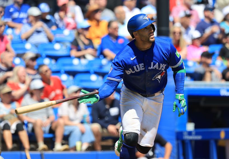 Mar 19, 2026; Dunedin, Florida, USA; Toronto Blue Jays designated hitter George Springer (4) hits a grand slam during the fourth inning against the New York Yankees at TD Ballpark. Mandatory Credit: Kim Klement Neitzel-Imagn Images