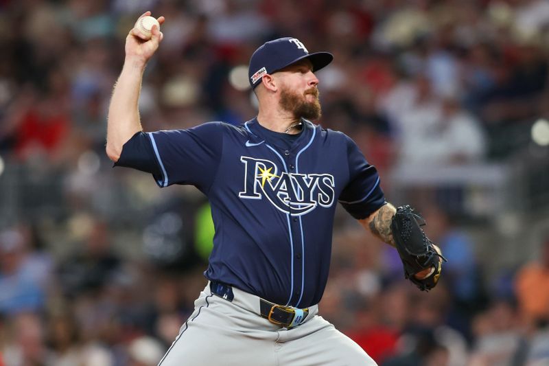 Jun 14, 2024; Atlanta, Georgia, USA; Tampa Bay Rays relief pitcher Chris Devenski (48) throws against the Atlanta Braves in the sixth inning at Truist Park. Mandatory Credit: Brett Davis-USA TODAY Sports