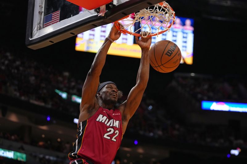 MIAMI, FL - MARCH 10: Jimmy Butler #22 of the Miami Heat dunks the ball during the game against the Washington Wizards on March 10, 2024 at Kaseya Center in Miami, Florida. NOTE TO USER: User expressly acknowledges and agrees that, by downloading and or using this Photograph, user is consenting to the terms and conditions of the Getty Images License Agreement. Mandatory Copyright Notice: Copyright 2024 NBAE (Photo by Eric Espada/NBAE via Getty Images)