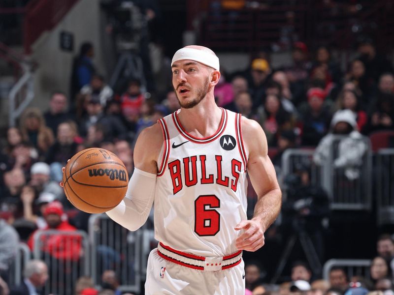 CHICAGO, IL - JANUARY 12: Alex Caruso #6 of the Chicago Bulls brings the ball up court during the game against the Golden State Warriors on January 12, 2024 at United Center in Chicago, Illinois. NOTE TO USER: User expressly acknowledges and agrees that, by downloading and or using this photograph, User is consenting to the terms and conditions of the Getty Images License Agreement. Mandatory Copyright Notice: Copyright 2024 NBAE (Photo by Jeff Haynes/NBAE via Getty Images)