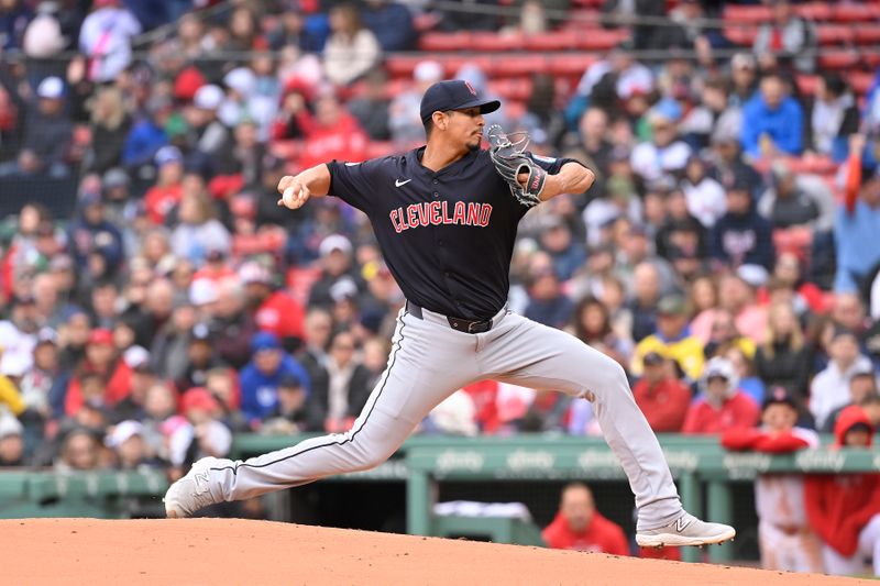 Apr 18, 2024; Boston, Massachusetts, USA; Cleveland Guardians starting pitcher Carlos Carrasco (59) pitches against the Boston Red Sox during the first inning at Fenway Park. Mandatory Credit: Eric Canha-USA TODAY Sports