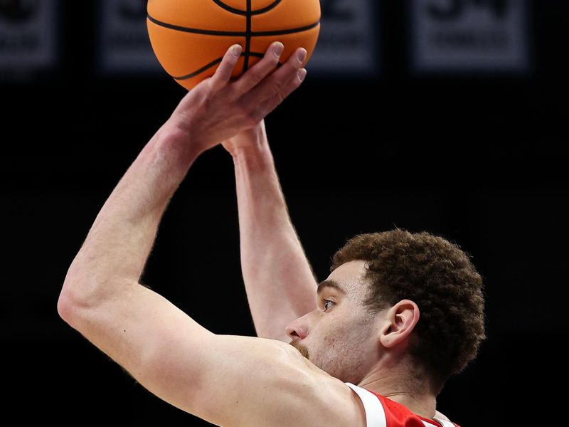 Mar 14, 2024; Minneapolis, MN, USA; Ohio State Buckeyes forward Jamison Battle (10) shoots against the Iowa Hawkeyes during the second half at Target Center. Mandatory Credit: Matt Krohn-USA TODAY Sports