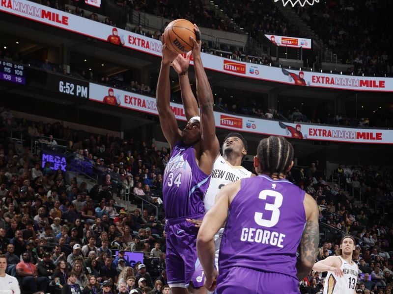 SALT LAKE CITY, UT - MARCH 2: Oscar Tshiebwe #34 of the Utah Jazz rebounds the ball during the game against the New Orleans Pelicans on March 2, 2025 at Delta Center in Salt Lake City, Utah. NOTE TO USER: User expressly acknowledges and agrees that, by downloading and or using this Photograph, User is consenting to the terms and conditions of the Getty Images License Agreement. Mandatory Copyright Notice: Copyright 2025 NBAE (Photo by Melissa Majchrzak/NBAE via Getty Images)