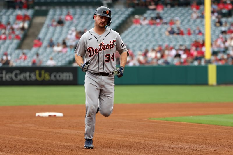 Sep 17, 2023; Anaheim, California, USA; Detroit Tigers catcher Jake Rogers (34) runs around bases after hitting a three-run home run during the third inning against the Los Angeles Angels at Angel Stadium. Mandatory Credit: Kiyoshi Mio-USA TODAY Sports