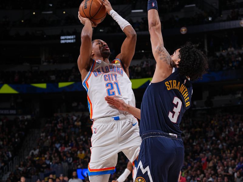 DENVER, CO - NOVEMBER 6:  Aaron Wiggins #21 of the Oklahoma City Thunder shoots the ball during the game against the Denver Nuggets during a regular season game on November 6, 2024 at Ball Arena in Denver, Colorado. NOTE TO USER: User expressly acknowledges and agrees that, by downloading and/or using this Photograph, user is consenting to the terms and conditions of the Getty Images License Agreement. Mandatory Copyright Notice: Copyright 2024 NBAE (Photo by Bart Young/NBAE via Getty Images)