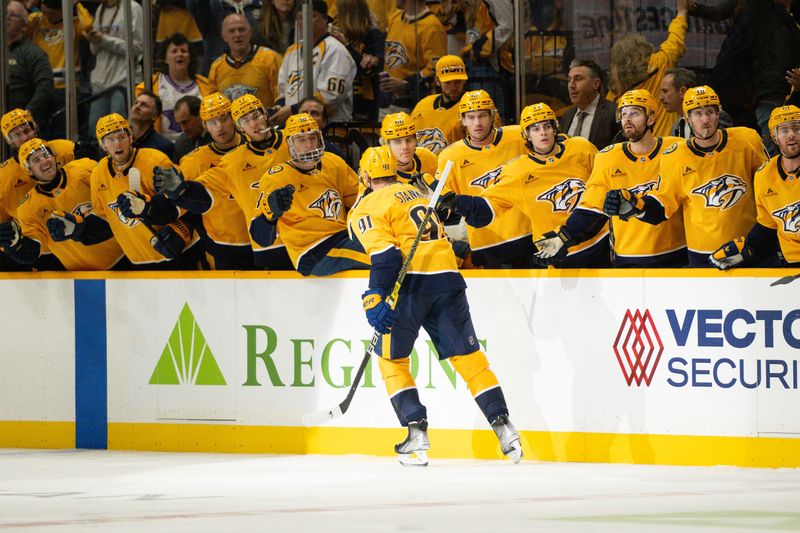 Nov 23, 2024; Nashville, Tennessee, USA;  Nashville Predators center Steven Stamkos (91) celebrates his goal with his teammates  against the Winnipeg Jets during the third period at Bridgestone Arena. Mandatory Credit: Steve Roberts-Imagn Images