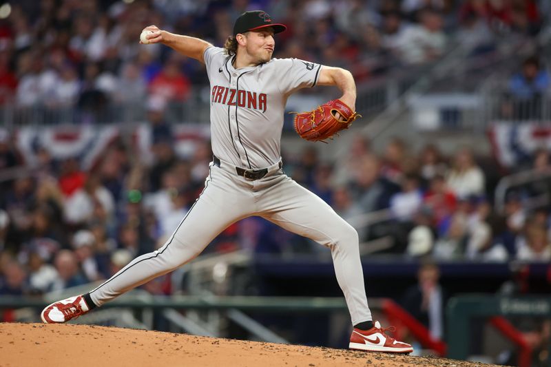 Apr 6, 2024; Atlanta, Georgia, USA; Arizona Diamondbacks starting pitcher Brandon Pfaadt (32) throws against the Atlanta Braves in the third inning at Truist Park. Mandatory Credit: Brett Davis-USA TODAY Sports