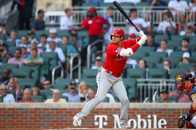 Aug 1, 2023; Atlanta, Georgia, USA; Los Angeles Angels designated hitter Shohei Ohtani (17) bats against the Atlanta Braves in the first inning at Truist Park. Mandatory Credit: Brett Davis-USA TODAY Sports