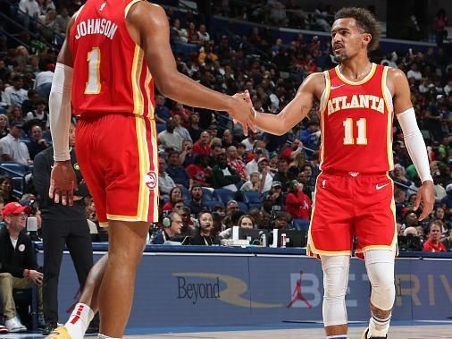 NEW ORLEANS, LA - NOVEMBER 4: Jalen Johnson #1 and Trae Young #11 of the Atlanta Hawks high five during the game against the New Orleans Pelicans on November 4, 2023 at the Smoothie King Center in New Orleans, Louisiana. NOTE TO USER: User expressly acknowledges and agrees that, by downloading and or using this Photograph, user is consenting to the terms and conditions of the Getty Images License Agreement. Mandatory Copyright Notice: Copyright 2023 NBAE (Photo by Layne Murdoch Jr./NBAE via Getty Images)