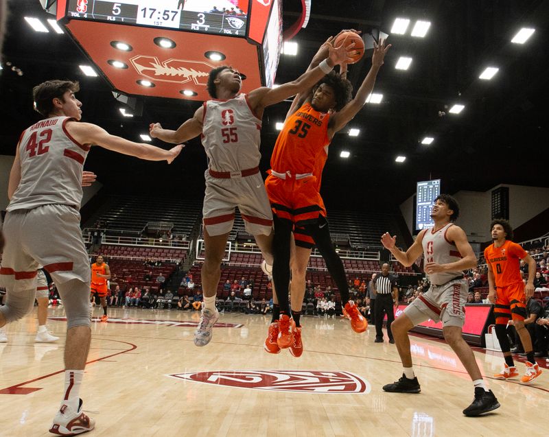 Jan 19, 2023; Stanford, California, USA; Stanford Cardinal forward Harrison Ingram (55) and Oregon State Beavers forward Glenn Taylor Jr. (35) vie for a loose ball during the first half at Maples Pavilion. Mandatory Credit: D. Ross Cameron-USA TODAY Sports