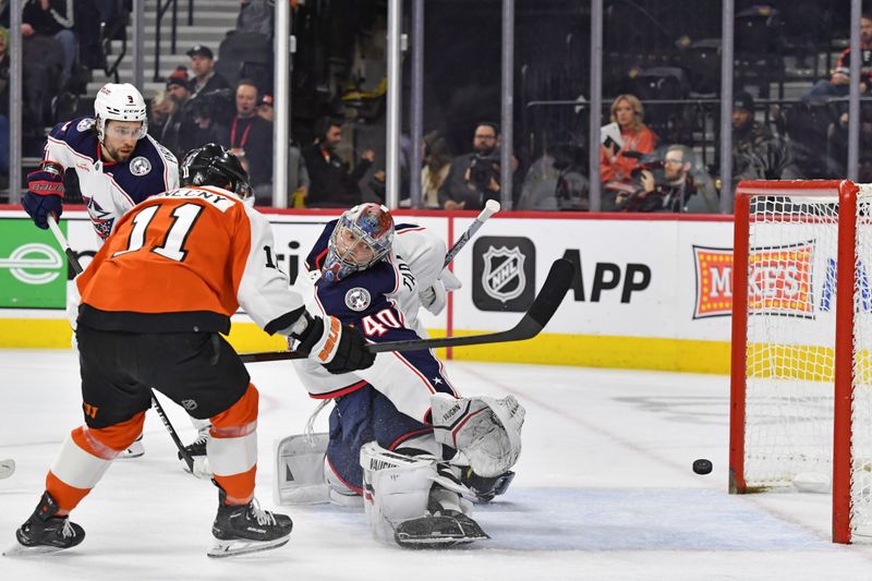 Jan 4, 2024; Philadelphia, Pennsylvania, USA;  Philadelphia Flyers right wing Travis Konecny (11) scores a goal against Columbus Blue Jackets goaltender Daniil Tarasov (40) during the first period at Wells Fargo Center. Mandatory Credit: Eric Hartline-USA TODAY Sports