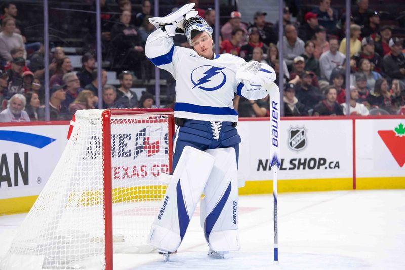 Oct 19, 2024; Ottawa, Ontario, CAN; Tampa Bay Lightning goalie Andrei Vasilevskiy (88) takes a break during the first period of game against the Ottawa Senators at the Canadian Tire Centre. Mandatory Credit: Marc DesRosiers-Imagn Images