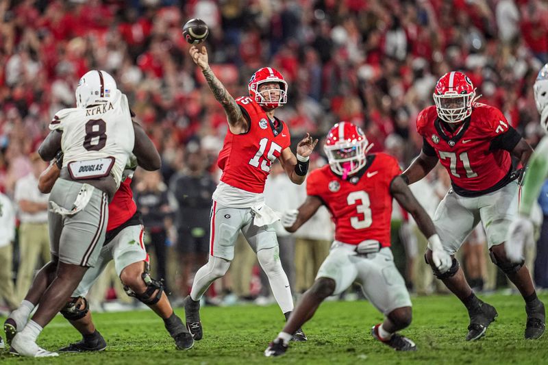 Oct 12, 2024; Athens, Georgia, USA; Georgia Bulldogs quarterback Carson Beck (15) passes the ball against the Mississippi State Bulldogs during the second half at Sanford Stadium. Mandatory Credit: Dale Zanine-Imagn Images