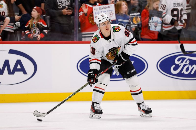 Oct 28, 2024; Denver, Colorado, USA; Chicago Blackhawks center Connor Bedard (98) warms up before the game against Colorado Avalanche at Ball Arena. Mandatory Credit: Isaiah J. Downing-Imagn Images