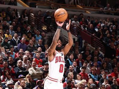 CHICAGO, IL - DECEMBER 20:  Coby White #0 of the Chicago Bulls shoots the ball during the game against the Los Angeles Lakers on December 20, 2023 at United Center in Chicago, Illinois. NOTE TO USER: User expressly acknowledges and agrees that, by downloading and or using this photograph, User is consenting to the terms and conditions of the Getty Images License Agreement. Mandatory Copyright Notice: Copyright 2023 NBAE (Photo by Jeff Haynes/NBAE via Getty Images)