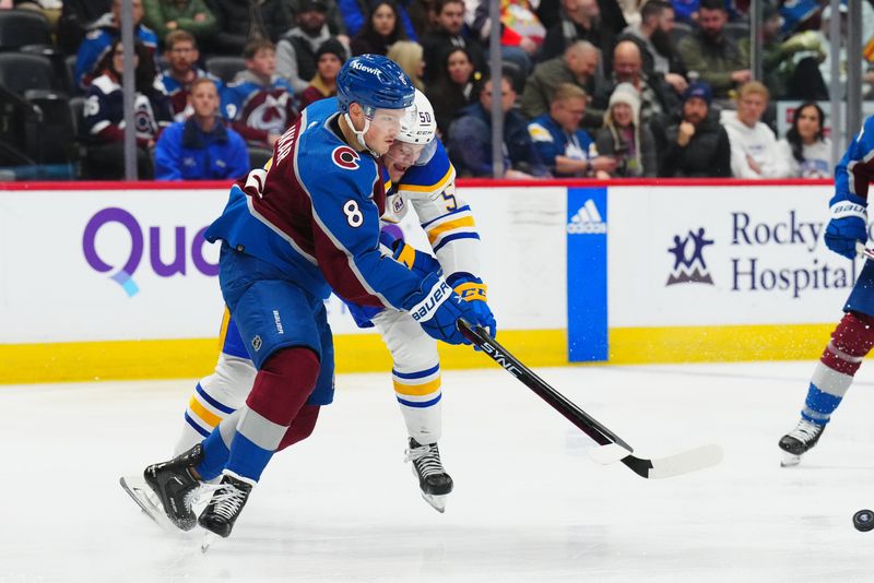 Dec 13, 2023; Denver, Colorado, USA; Colorado Avalanche defenseman Cale Makar (8) collides into Buffalo Sabres left wing Eric Robinson (50) in the third period at Ball Arena. Mandatory Credit: Ron Chenoy-USA TODAY Sports