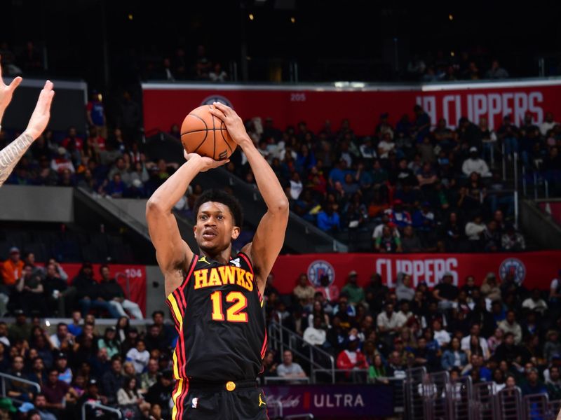 LOS ANGELES, CA - MARCH 17: De'Andre Hunter #12 of the Atlanta Hawks shoots the ball during the game against the LA Clippers on March 17, 2024 at Crypto.Com Arena in Los Angeles, California. NOTE TO USER: User expressly acknowledges and agrees that, by downloading and/or using this Photograph, user is consenting to the terms and conditions of the Getty Images License Agreement. Mandatory Copyright Notice: Copyright 2024 NBAE (Photo by Adam Pantozzi/NBAE via Getty Images)