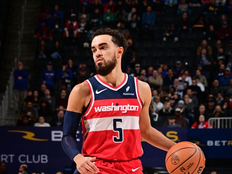 DETROIT, MI - JANUARY 27: Tyus Jones #5 of the Washington Wizards dribbles the ball during the game against the Detroit Pistons on January 27, 2024 at Little Caesars Arena in Detroit, Michigan. NOTE TO USER: User expressly acknowledges and agrees that, by downloading and/or using this photograph, User is consenting to the terms and conditions of the Getty Images License Agreement. Mandatory Copyright Notice: Copyright 2024 NBAE (Photo by Chris Schwegler/NBAE via Getty Images)