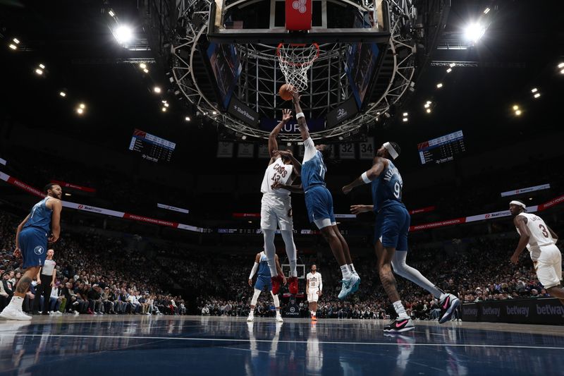 MINNEAPOLIS, MN -  MARCH 22: Tristian Thompson #13 of the Cleveland Cavaliers drives to the basket during the game against the Minnesota Timberwolves on March 22, 2024 at Target Center in Minneapolis, Minnesota. NOTE TO USER: User expressly acknowledges and agrees that, by downloading and or using this Photograph, user is consenting to the terms and conditions of the Getty Images License Agreement. Mandatory Copyright Notice: Copyright 2024 NBAE (Photo by Jordan Johnson/NBAE via Getty Images)