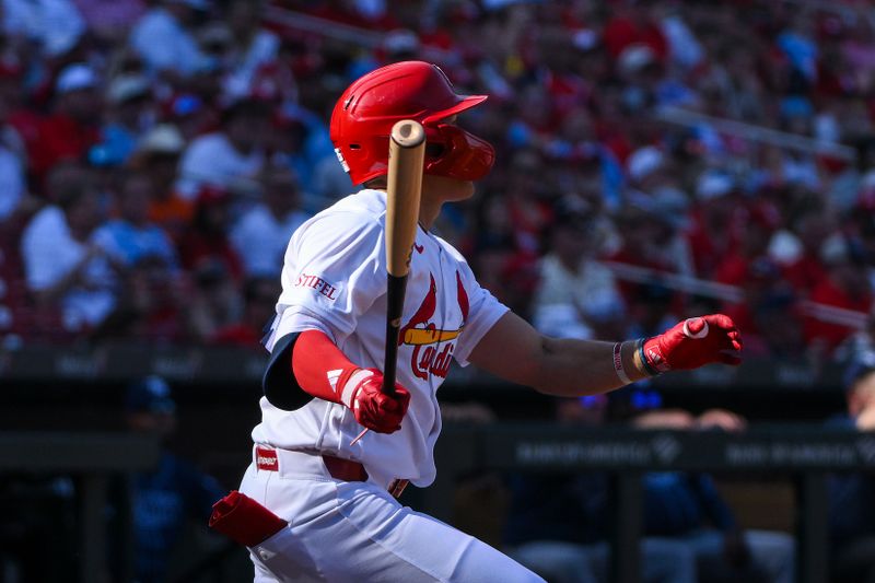 Mar 26, 2026; St. Louis, Missouri, USA; St. Louis Cardinals second baseman JJ Wetherholt (26) hits a solo home run for his first major league hit during his major league debut in the third inning against the Tampa Bay Rays at Busch Stadium. Mandatory Credit: Jeff Curry-Imagn Images