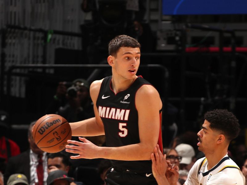 MIAMI, FL - JANUARY 2: Nikola Jovic #5 of the Miami Heat looks on during the game against the Indiana Pacers on January 2, 2025 at Kaseya Center in Miami, Florida. NOTE TO USER: User expressly acknowledges and agrees that, by downloading and or using this Photograph, user is consenting to the terms and conditions of the Getty Images License Agreement. Mandatory Copyright Notice: Copyright 2025 NBAE (Photo by Issac Baldizon/NBAE via Getty Images)